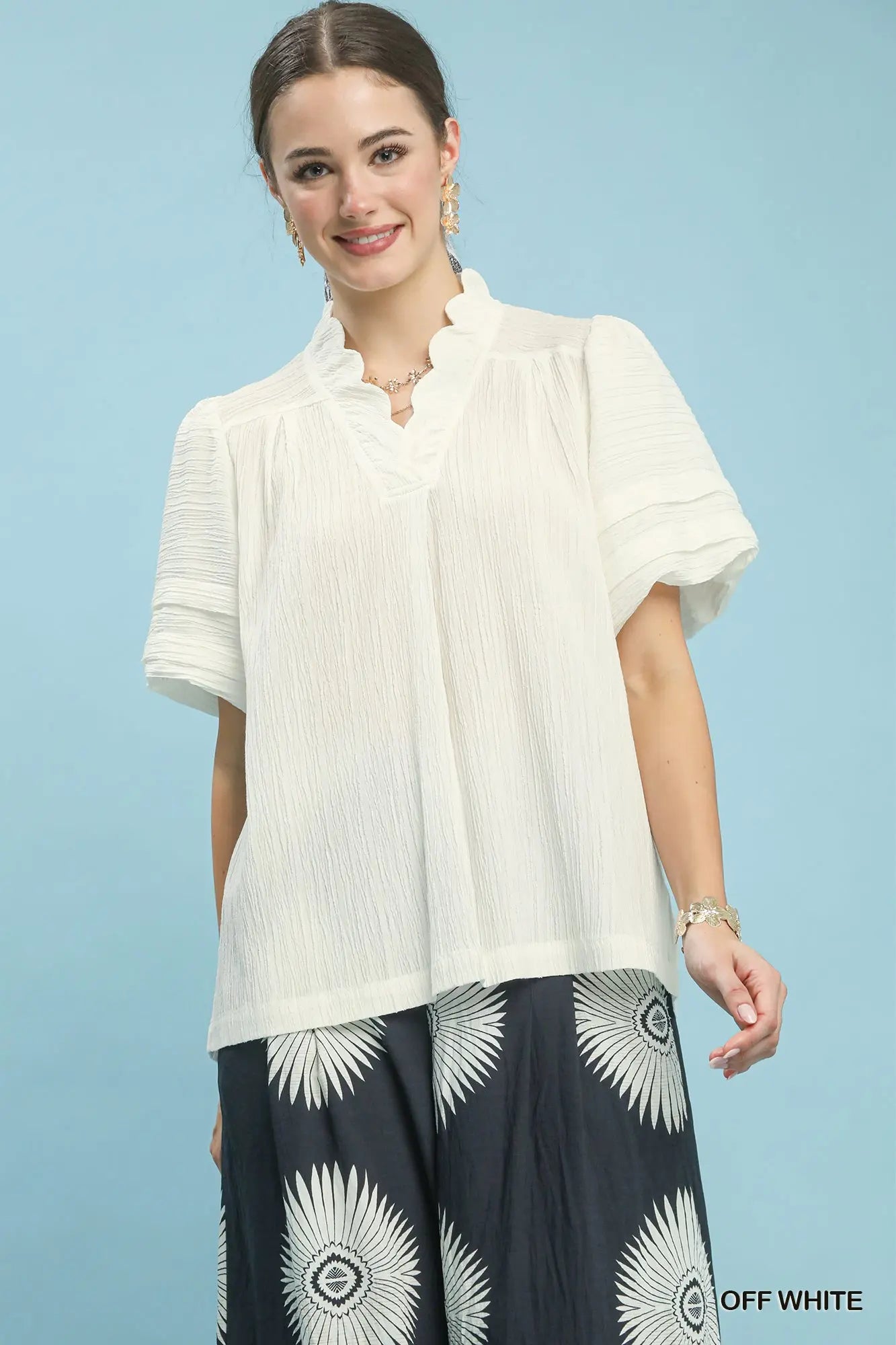 This Seersucker Scalloped V-Neck Top