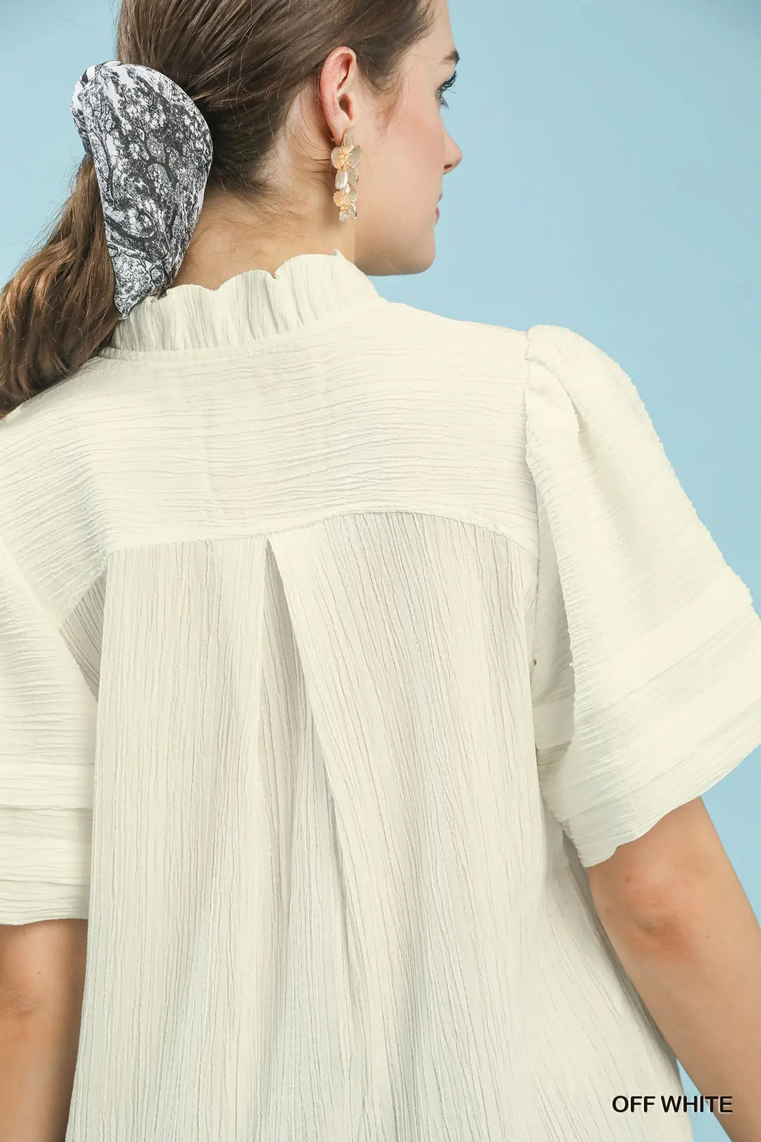 This Seersucker Scalloped V-Neck Top